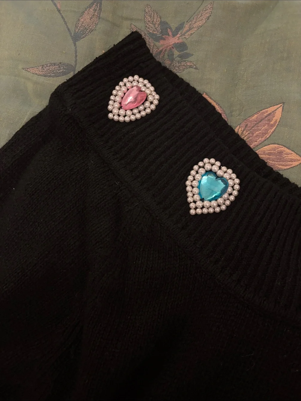 Black Off-Shoulder Sweater with Multicolor Gem Accents